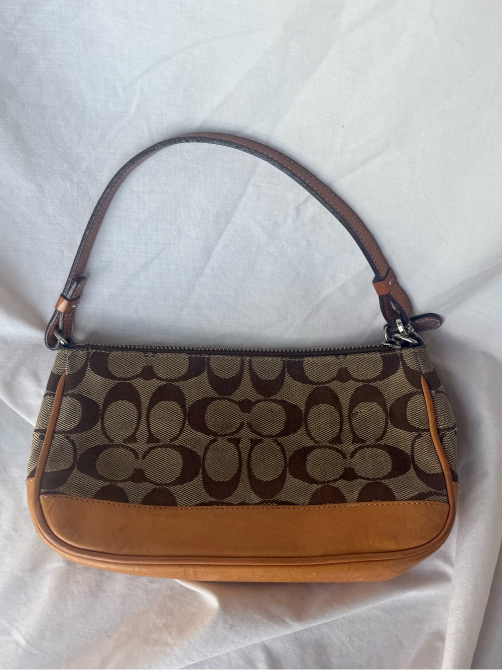 Coach Signature Demo brown and tan purse 
Good Condition
